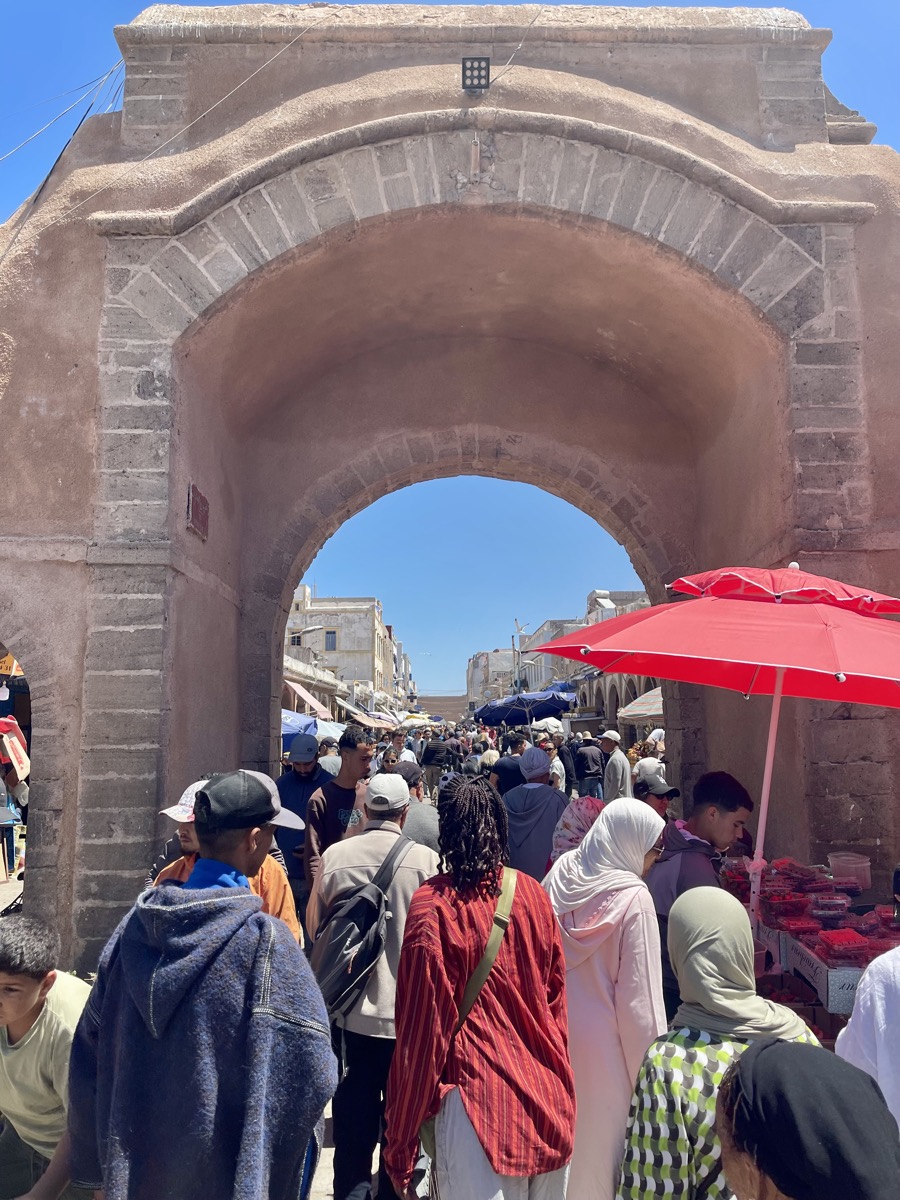 The bustling medina gate in Essaouira