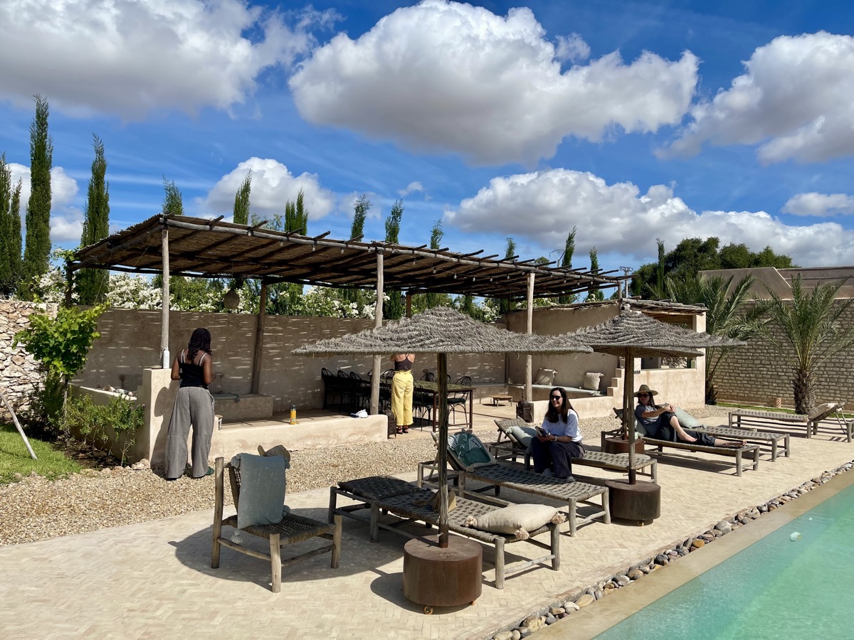 Guests relaxing by the pool